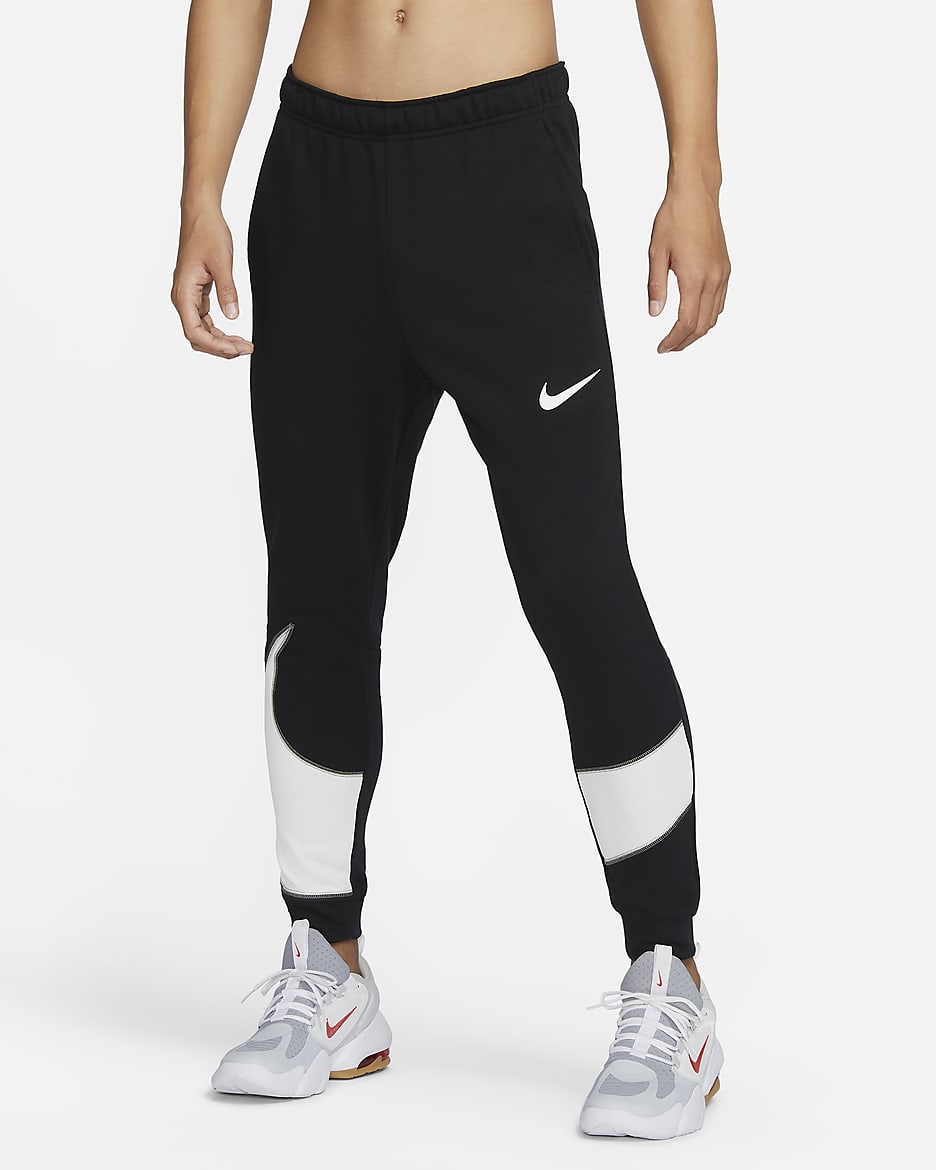 Nike dri fit tapered jogging bottoms mens best sale